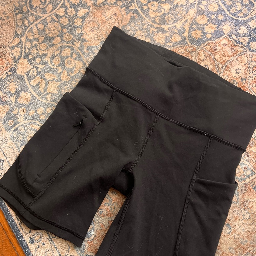 Athleta Black Bike Shorts with High-Waisted Design and Moisture-Wicking Fabric